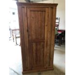 An Antique Pine Cabinet with shelves 185cm H x 40cm D x 90cm W