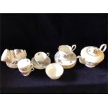 A Paragon Tea Service with six settings in the 'Pompadour' pattern