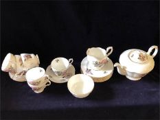 A Paragon Tea Service with six settings in the 'Pompadour' pattern