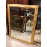 A large squared framed mirror