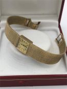 A Ladies 9ct gold Tissot Stylist Ladies Watch.