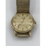 A 9ct gold Omega Geneve gents watch