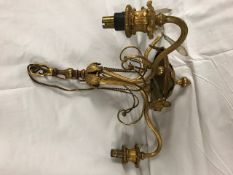 A Three Arm Gilt Centre light with entwined leaf decoration.