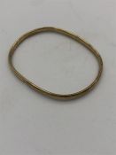 A 9ct Yellow gold bangle (4.9g)