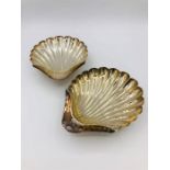 A Pair of hallmarked silver shell shaped bowls.