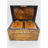 An inlaid tea caddy