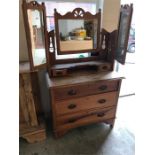 A Dressing table in pine with tri fold dressing mirror with two small drawers under, three main