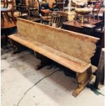 An Antique Church Pew 228cm x 70cm w x 94cm H, complete with kneeler.