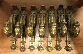 Seven Gilt hooks with feather and grape detail, Bacchus inspired