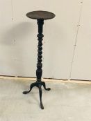 A Tall plant stand on barley twist stand with tripod legs