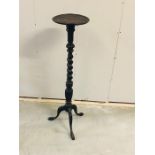 A Tall plant stand on barley twist stand with tripod legs