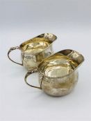 Two Silver milk jugs, hallmarked