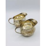 Two Silver milk jugs, hallmarked