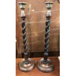 A Pair of Barley twist candlesticks