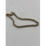 A 9ct yellow gold and diamond bracelet (7.2g)