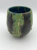 A Vase by Indian Artist Gulbanoo McGee, when based in Bombay, signed GM to base in green and brown