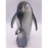 A Lladro figure 'Penguin Love' 19cm Tall.