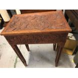 An Arts And Crafts carved sewing box