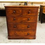 A Victorian Chest of two over three drawers