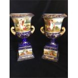 A Pair of Viennese two handled vase with hand painted scenes