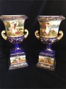 A Pair of Viennese two handled vase with hand painted scenes