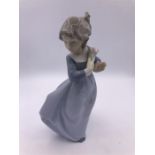 Nao figure of a girl holding flowers (20cm)