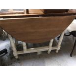 A Drop leaf table with white painted legs