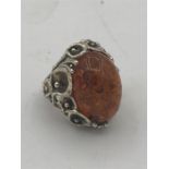 A silver ladies Dress ring with Amber style Cabochon