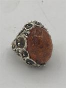 A silver ladies Dress ring with Amber style Cabochon