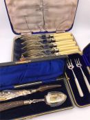 A selection of boxed cutlery