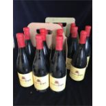 Eighteen bottles of Andre Roux Terre des Papes Cotes-Du-Rhone Villages wine.