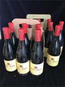 Eighteen bottles of Andre Roux Terre des Papes Cotes-Du-Rhone Villages wine.