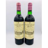 Two Bottles of Chateau La Mission Haut Brion Graves 1976 wine.
