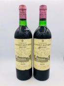 Two Bottles of Chateau La Mission Haut Brion Graves 1976 wine.