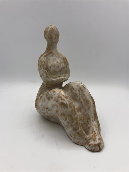 A seated nude in clay by Indian Artist Gulbanoo McGee, when based in Bombay.