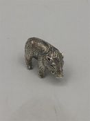 A miniature silver figure of a Boar