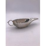 A silver sauce boat Hallmarked Birmingham 1933-34 by S.B & S Ltd (65.3g)