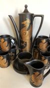 A Portmeirion 'Phoenix' design by John Cuffley coffee set to include six coffee cans and saucers