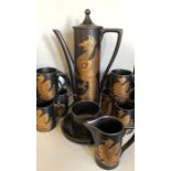 A Portmeirion 'Phoenix' design by John Cuffley coffee set to include six coffee cans and saucers