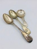 Three silver spoons to include a Caddy spoon.