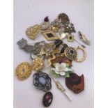 A selection of costume jewellery brooches