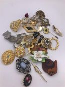 A selection of costume jewellery brooches