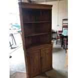 An Antique Pine Corner Cabinet 190cm x 90cm with three shelves and cupboard under