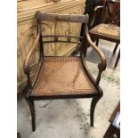 A Regency cane seated chair., with brass decoration.