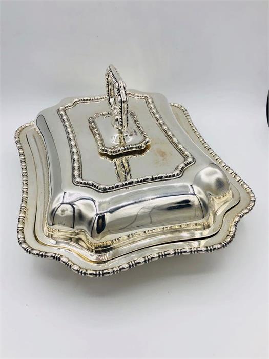 A Hallmarked silver serving dish, makers mark HA. (1.340Kg)