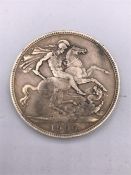 A Great Britain 1900 Crown (LXIV) Victoria and George and the Dragon to reverse. VF Silver.