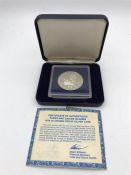 A 1979 10 Crown silver proof coin for Turks and Caicos by the Royal Mint of London