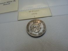 A French Afars and Issas 1970 50 Franc Coin (VF) A French Colonies 1839 5 Centimes (VF) coin and