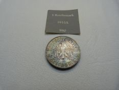 A 1933 German 5 Reichsmark, silver coin, rainbow toning, 13.9g UNC Eagle with Martin Luther to