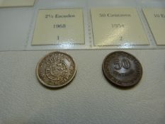 Four Angolan coins to include 2½ Escudos, 50 Centavos, 10 Escudos, 20 Centavos